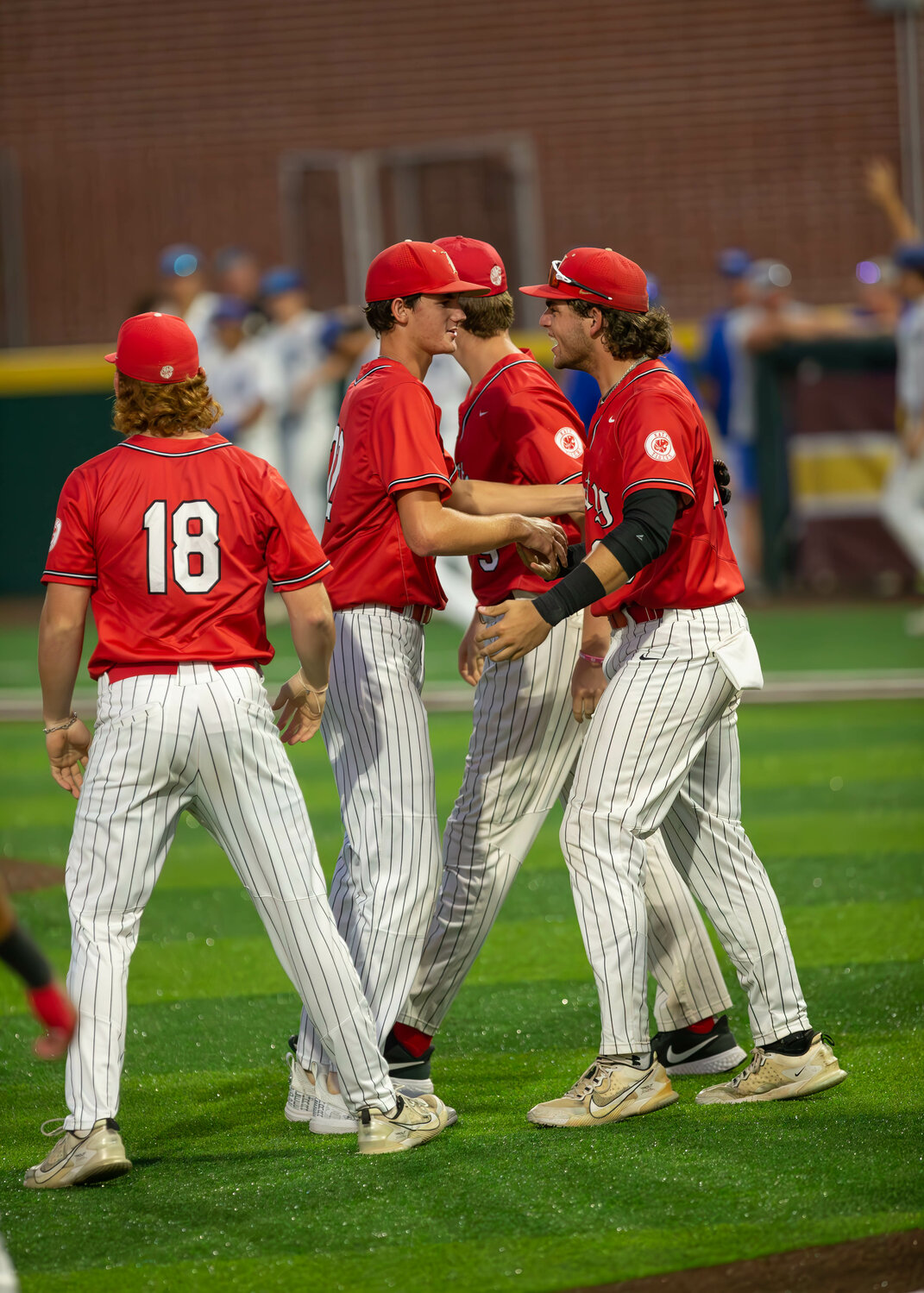 Cole Kaase celebrates with Cade Nelson after an inning during Wednesday's Regional Semifinal between Katy and Clear Springs at Deer Park.